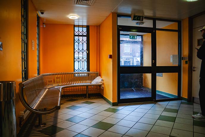 reception room with an uncomfortable-looking metal bench